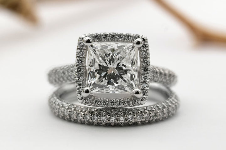 Diamond Engagement Ring with Diamond Eternity Wedding Ring - Photo Credit: Sabrinna Ringquist/Unsplash